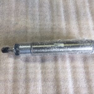Metallic cylindrical vape pen on a textured surface.