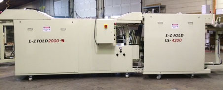 A large industrial machine in a warehouse setting.
